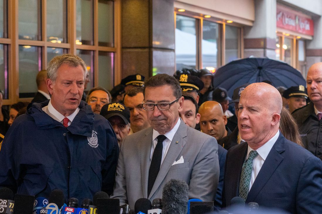 The mayor with fire and police officials (David "Dee" Delgado /  Gothamist)